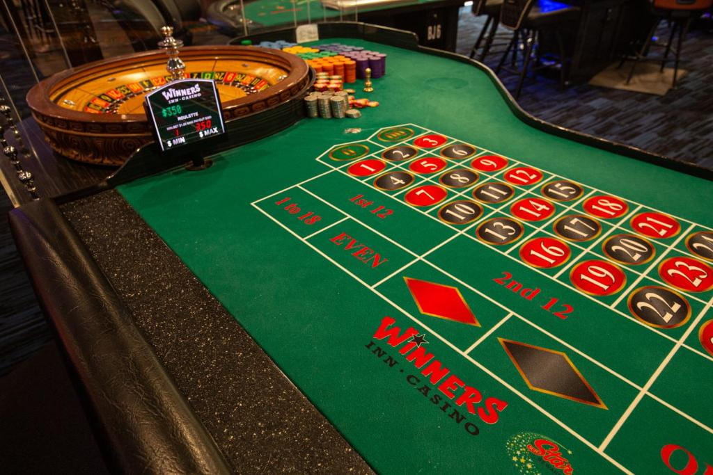 Roulette table close-up with number layout and chips